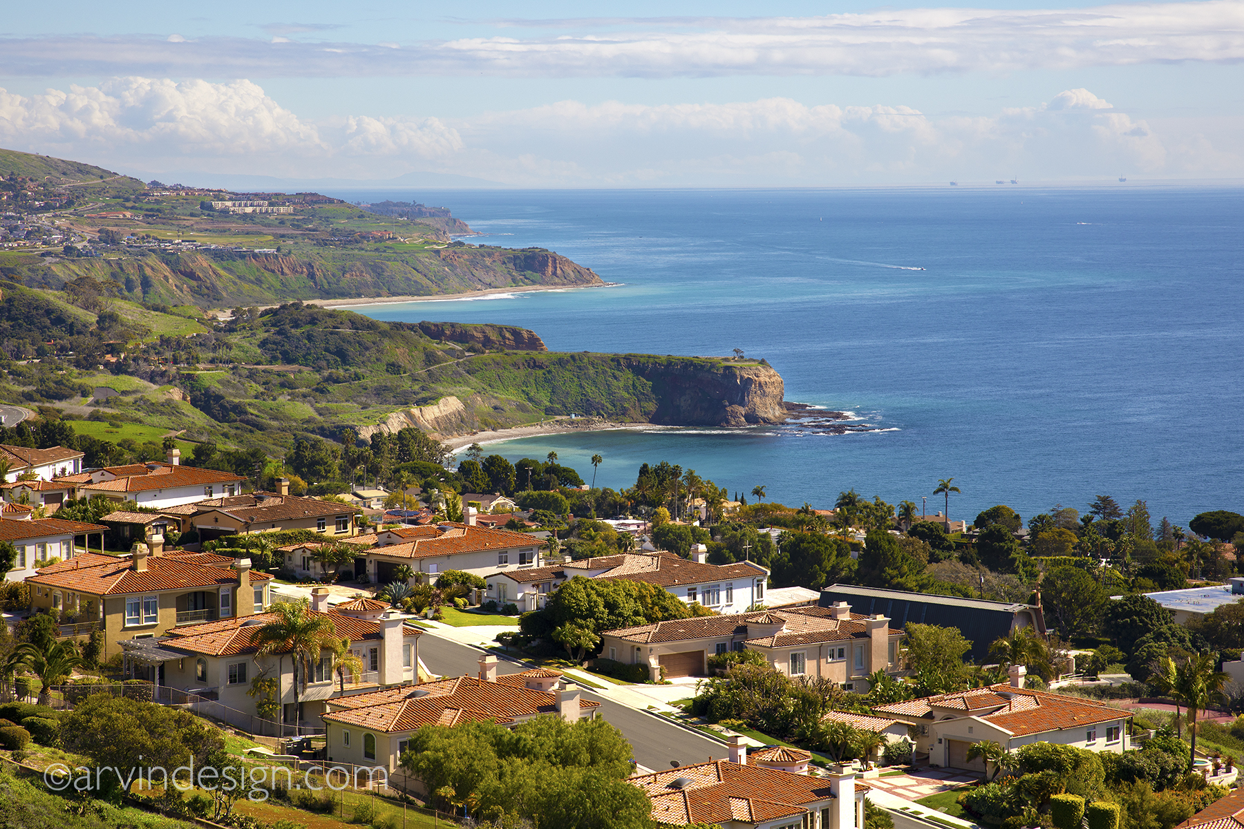 Image overlooking the Palos Verdes Coast with homes near the bottom.